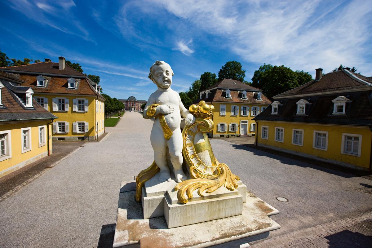 Cherub at the entrance to the garden side of Bruchsal Palace